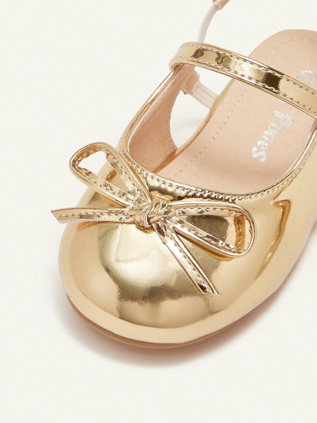 Sapatilha Infantil Feminina Slingback Bico Redondo com Laço Metalizada