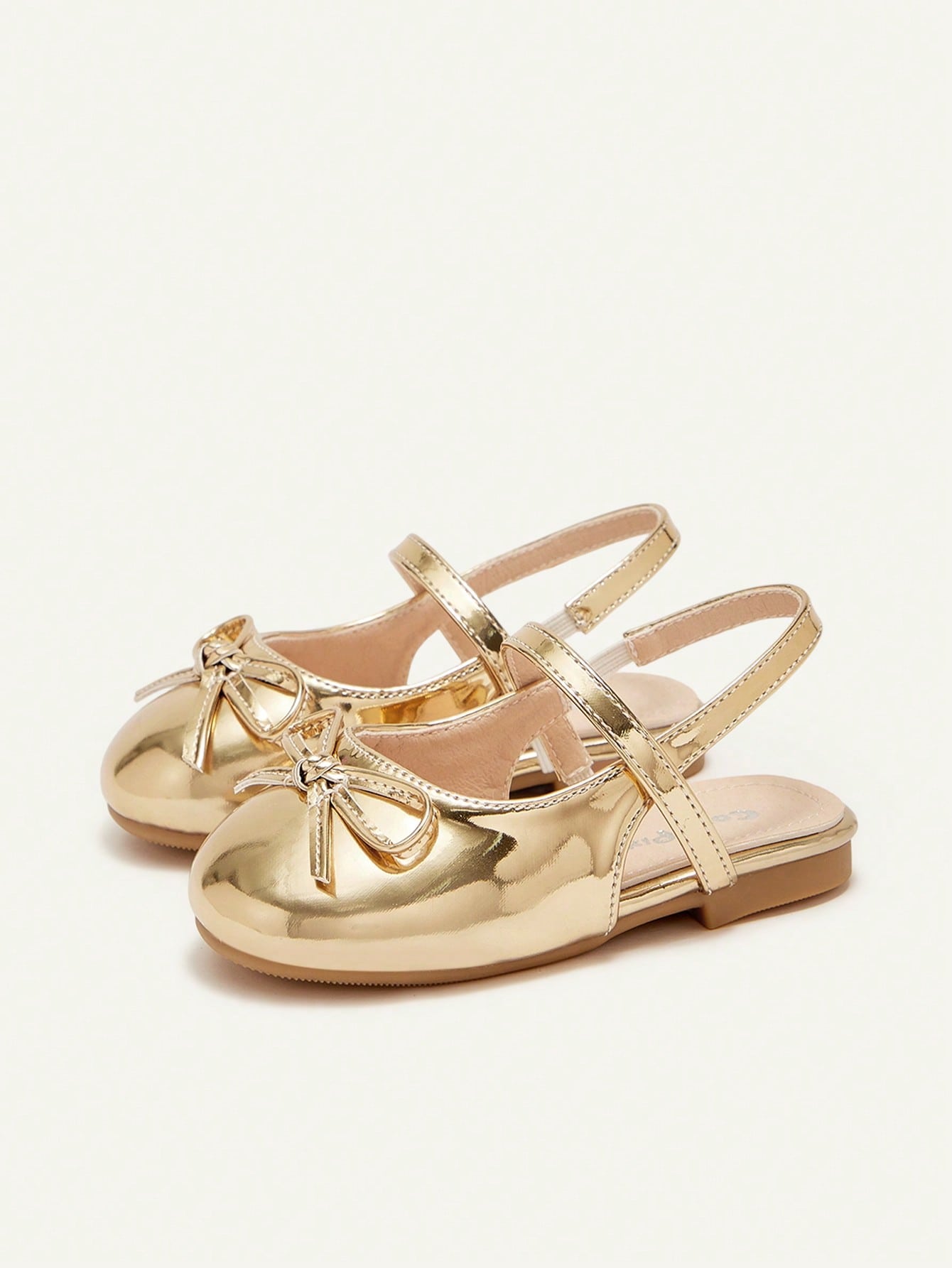 Sapatilha Infantil Feminina Slingback Bico Redondo com Laço Metalizada