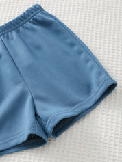 Conjunto 2 Peças Bebê Menino Camiseta Monstros Colorida e Shorts Liso