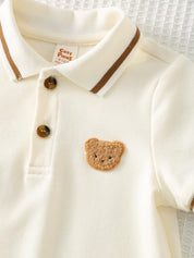 Macacão Body Bebê Menino Polo Manga Curta Patch Urso