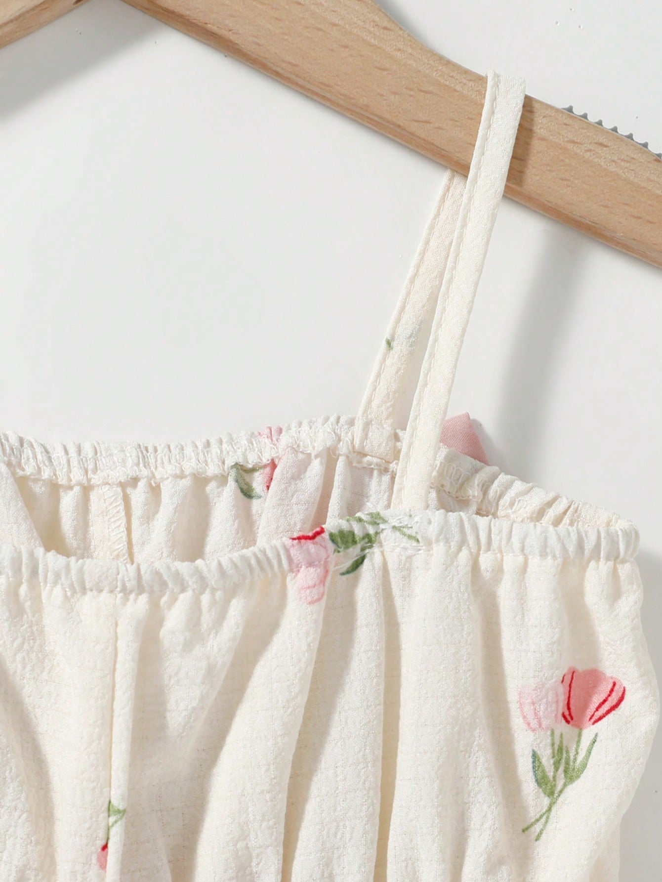Macacão Bebê Menina Curto Alça Fina Estampa Floral Tulipa com Laço