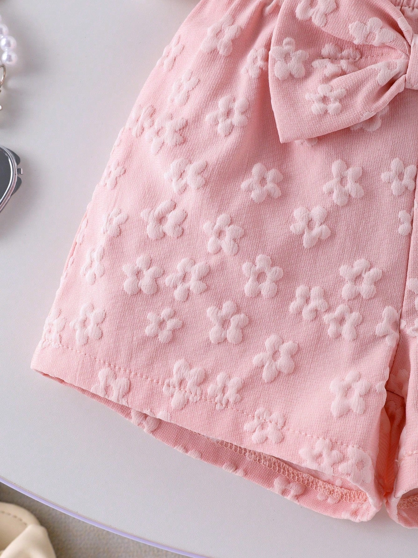 Conjunto Bebê Menina 2 Peças Top Floral Ombro Assimétrico e Shorts com Laço