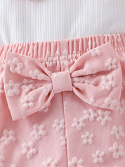 Conjunto Bebê Menina 2 Peças Top Floral Ombro Assimétrico e Shorts com Laço