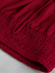 Calça Gestante Pantalona com Cós Franzido, Amarração e Bolsos - Vinho