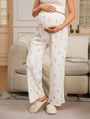 Calça Gestante Reta Floral em Malha Jacquard com Cós Ajustável - Bege