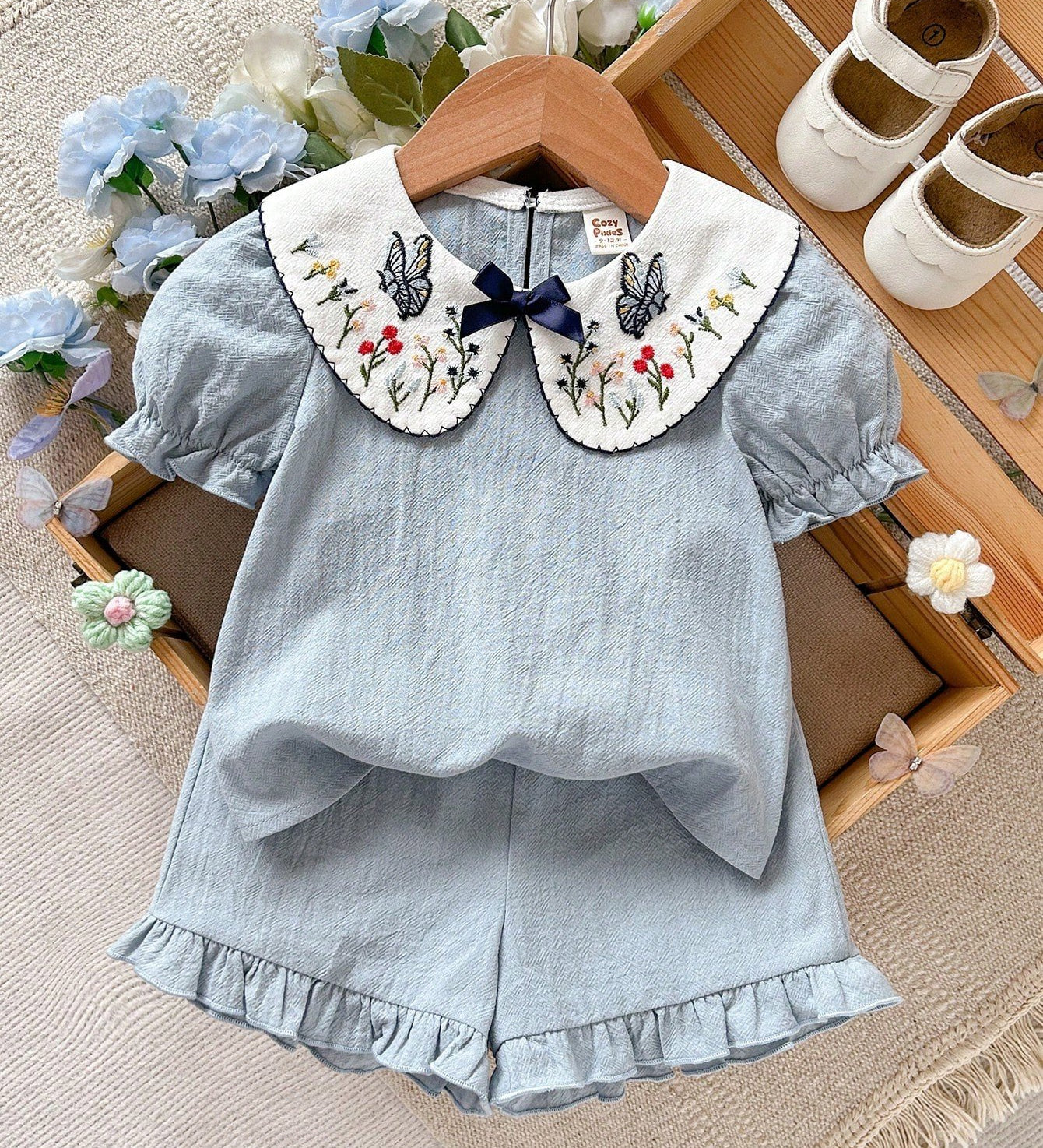 Conjunto 2 Peças Bebê Menina Blusa Gola Peter Pan Bordada Borboleta e Shorts 001 Conjunto Menina 02 Kabannas Azul-claro 6-9 Meses 