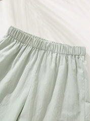 Conjunto Infantil Menino Camisa Coqueiros e Shorts Verde em Algodão - Creme e verde