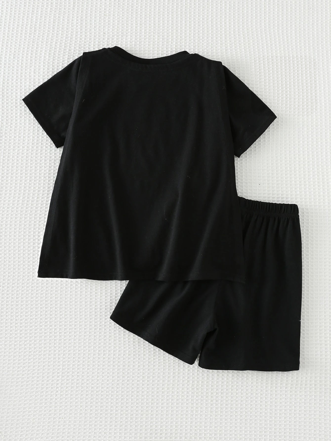 Fantasia infantil com capa e shorts – vista traseira