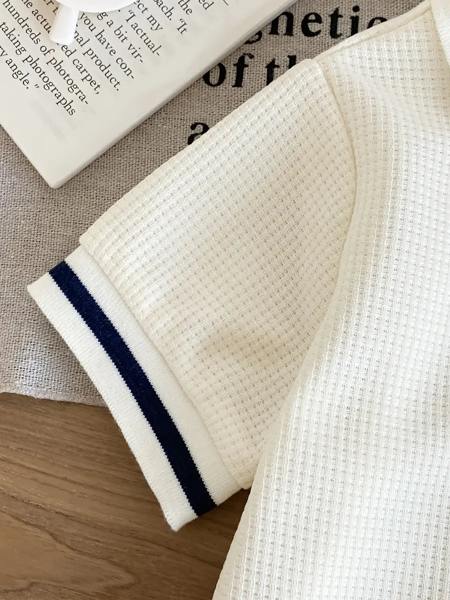 Conjunto 2 Peças Infantil Masculino Polo Manga Curta Malha Waffle Off-White Shorts Elástico