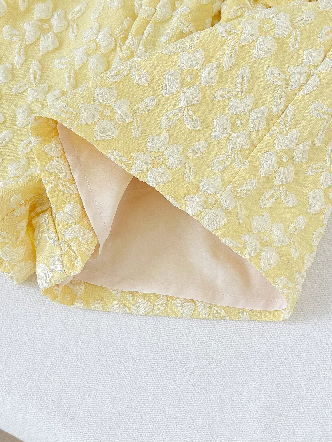 Macacão Romper Bebê Menina Jacquard Floral com Laço Frontal