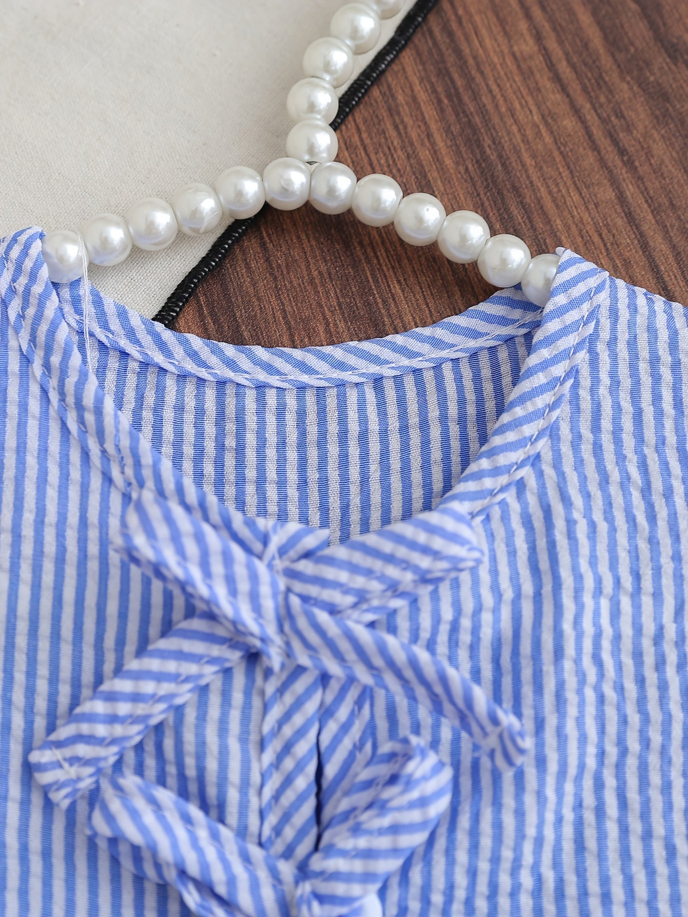 Conjunto Infantil Menina 2 Peças Blusa sem Manga com Laço e Calça Reta Listrada Seersucker