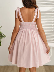 Vestido Gestante e Amamentação Curto Listrado com Botões e Laço nos Ombros - Rosa e branco